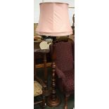 A turned wood standard lamp with shade; together with a pot stand, 94cmH