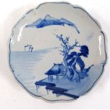 Japanese sometsuke blue and white plate, decorated with a scene of a house and tree beneath