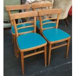 A set of four mid-century beechwood and vinyl kitchen chairs