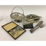 A small mixed lot of plated items, to include a quantity of flatware, swing handled basket, decanter