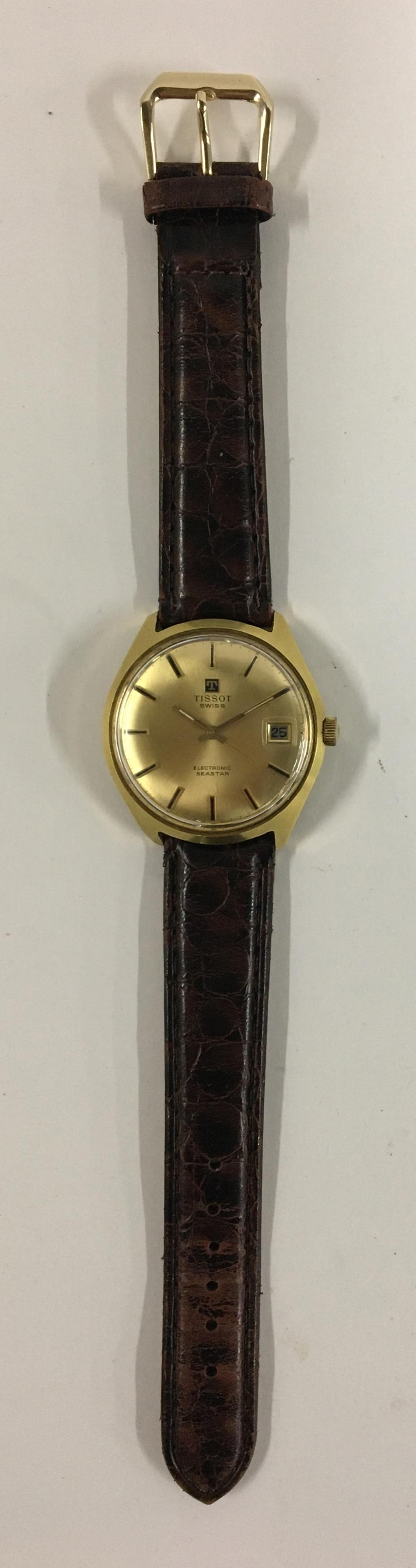 A Tissot Seastar gent's electromechanical steel and gold plated watch, with date aperture, on