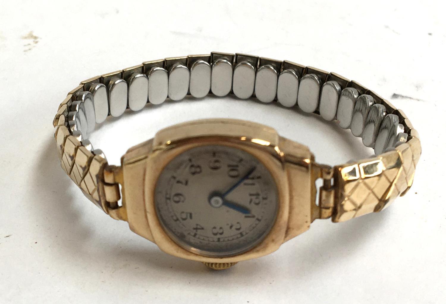 9ct gold ladies watch with metal strap (engraving on the back)