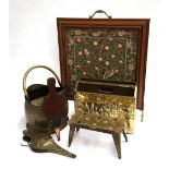 A coal scuttle, two sets of bellows, brass trivet, magazine rack and embroidered fire screen