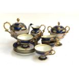 A Noritake tea set, swan lake design, including four cups and saucers, teapot, milk jug and sugar