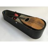 An Italian bowlback mandolin (af)