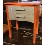 A small bedside table, painted in orange and silver, 58cmH
