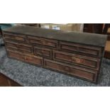 A vintage set of workshop drawers, three over three over two
