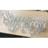 A mixed lot of glass to include engraved decanter, various wine glasses, tumblers etc