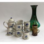 A coffee set marked 'Made in China', together with a studio glass vase and a studio pottery mug