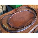A kidney shaped gallery tray, with marquetry inlay, 58cmW; together with one other