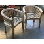 A pair of substantial garden chairs, each 73cmW
