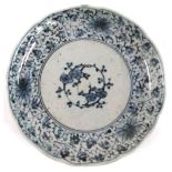 A Japanese Imari porcelain plate, with floral design, Edo period, made in Hizen region, marks to