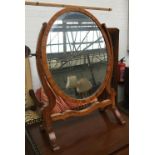 A 19th century oval adjustable dressing mirror, 46cmH