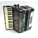 A Parrot piano accordion, 24 buttons, in hard case
