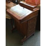 A 20th century davenport desk, superstructure with hinged lid, writing slope flanked by four drawers