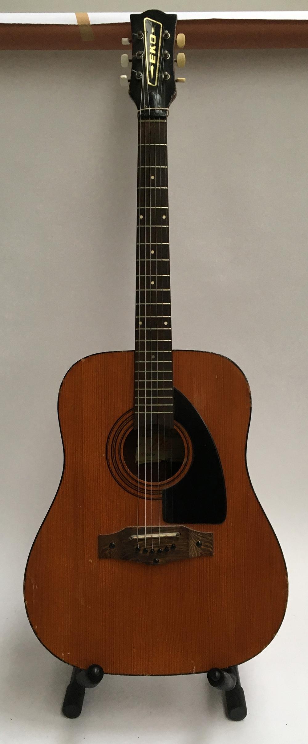 An Eko acoustic guitar, model Grande VI (some damage), in soft case