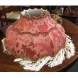 A large tasseled and beaded lamp shade, 57cmD