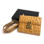 A Nicola de Roma 'Ligator' purse with strap, in beige, boxed