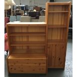 A modern pine bookshelf and cupboard unit, 122cmW