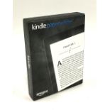 An Amazon Kindle Paperwhite, new and sealed in box