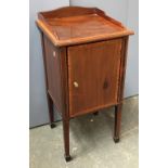 A mahogany and crossbanded pot cupboard/bedside table, three quarter gallery top, cupboard door,