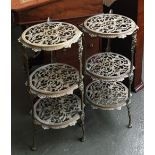 A pair of pierced brass three tier plant stands, 64cmH