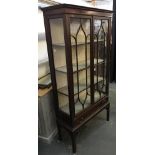 An astragal glazed display cabinet, on square section legs, with pierced spandrils, 93x39x85cm