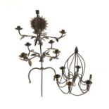 A wrought iron eight arm candle holder; together with a similar six arm hanging chandelier