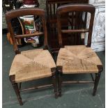 A pair of occasional chairs with rush seats