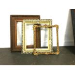 Three carved giltwood frames, the largest measuring 38x27.5cm internal