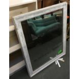 A wall mirror within a whitewashed frame, 80x64