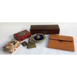 A mixed lot to include leatherbound box with chased metal mounts; leather wallet; leather cased card