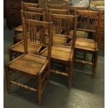 A set of nine provincial Sussex style kitchen chairs, with solid seats