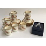 A Hammersley 'Dresden Sprays' part tea set; together with a boxed Caithness bell commemorating the