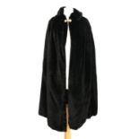 A ladies black velvet cape, approx size 10-12