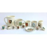 A box of WH Goss crested china, to include a large tankard; tygs; tortoise; cat; commemorative