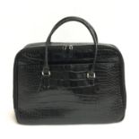 A 'Furla' black leather handbag with fitted interior, approx. 43x30x11cm