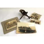 A stereoscope viewer together with a number of stereoscope slides; together with an early 20th