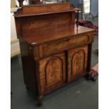 A late 19th century mahogany chiffonier, galleried superstructure over single baize lined secretaire