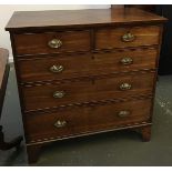 A 19th century mahogany chest of two short over three graduating drawers on bracket feet,