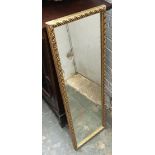 A gilt framed wall mirror, 100x31.5cm