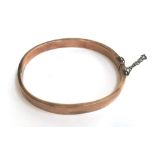 A 9ct rose gold bracelet with safety chain, gross weight 7.6g