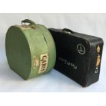 A green tin hat box and a vintage suitcase (af)