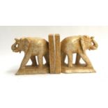 A pair of carved stone elephant bookends, each 15.5cmH