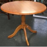 A modern circular pine table, 89cmD