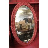 A painted oval acanthus wall mirror, bevelled plate, 63x40cm