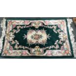 A handmade Chinese wool rug, 152x91cm