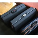 Two Samsonite hard plastic suitcases, each approx. 70cmW
