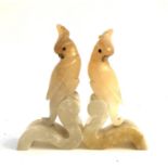 A pair of 20th century Italian onyx cockatiel bookends, each 17cmH