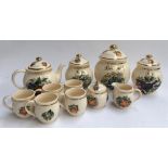 A quantity of Henry's Staffordshire china to include teapot and cups, several lidded jars marked '